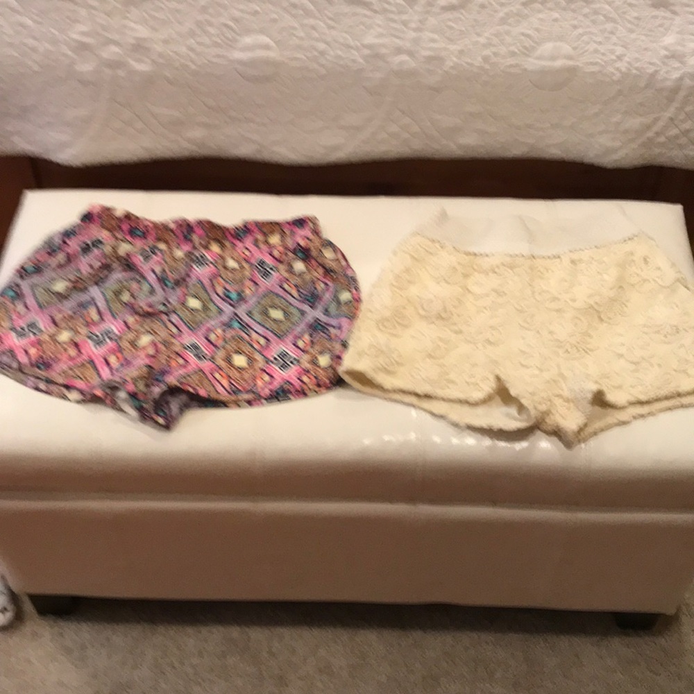 Two Pairs of Shorts - one Geometric Design other Flower Stitch Design